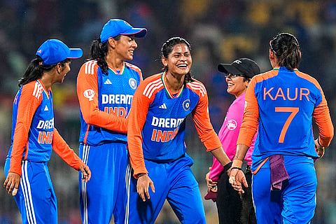 Radha Yadav celebrates the wicket of Annerie Dercksen